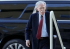 Bolton surrenders to face charges of sharing classified information